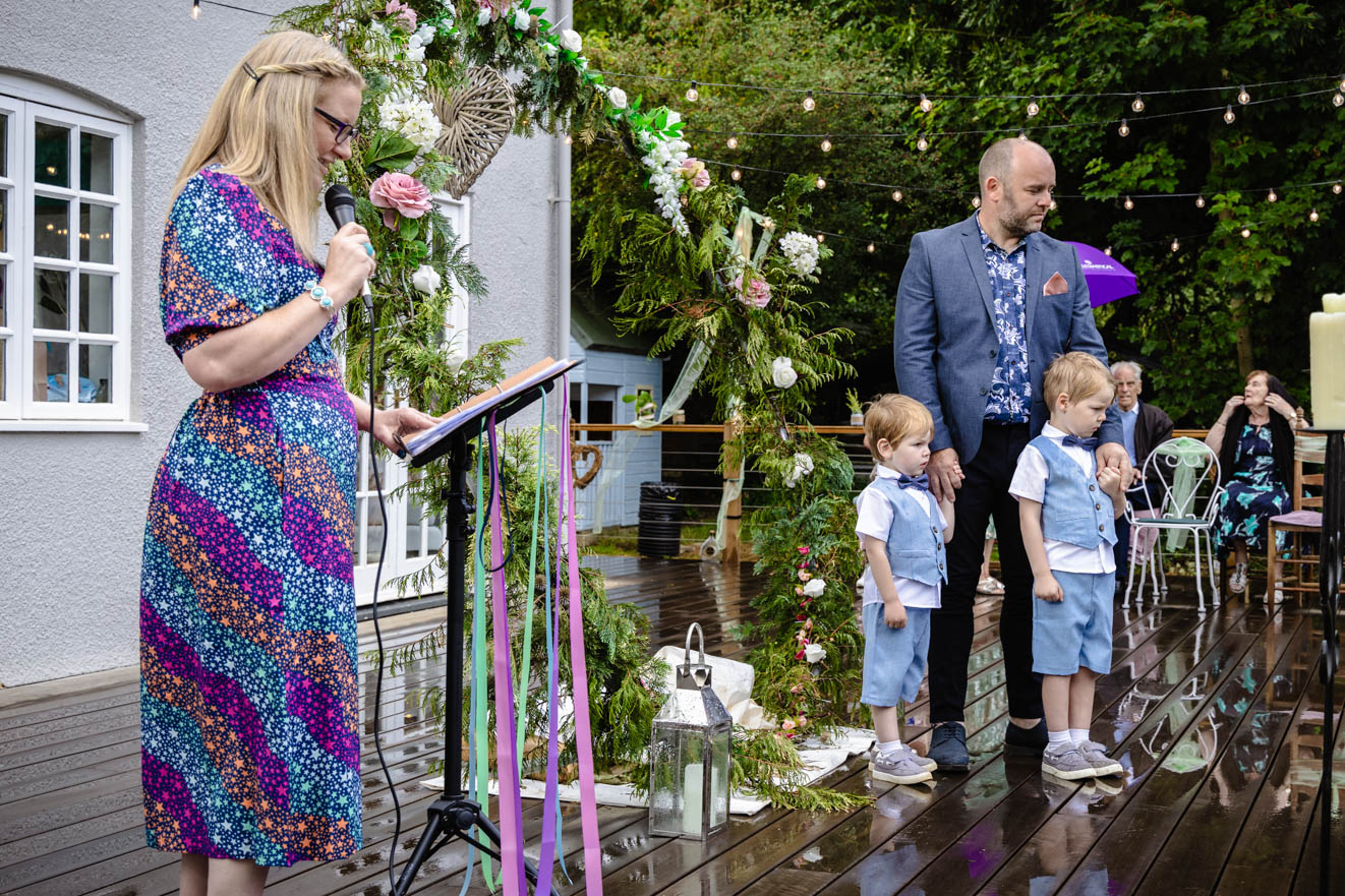 Deb Reed Celebrant Colchester Essex, playing the Mr & Mrs paddle game at the vowel renewal of Gary and Kelly.